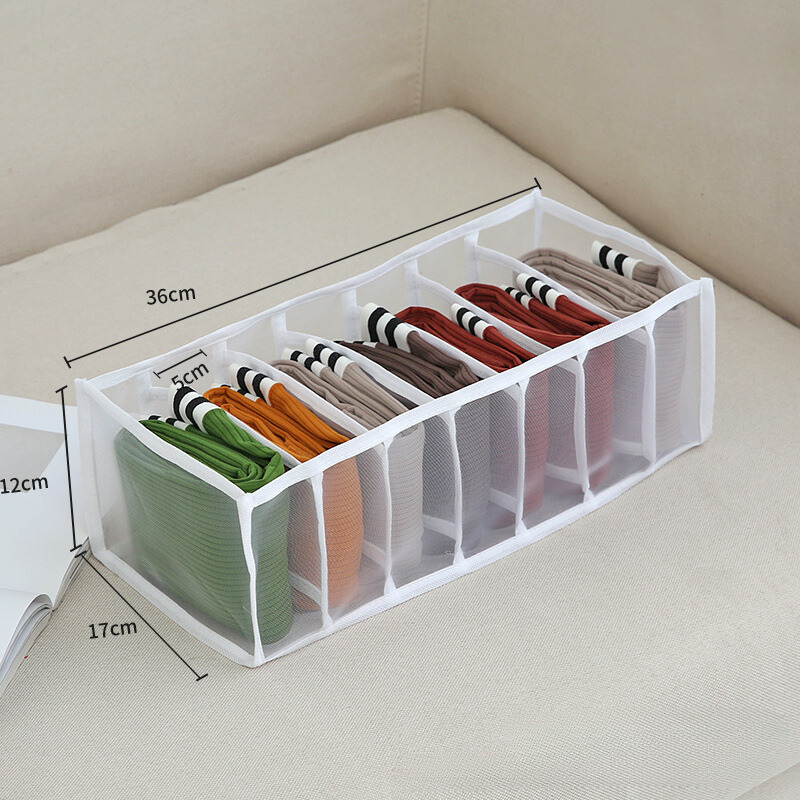 Pants and clothes storage box with partitions, designed for organizing wardrobe drawers and maximizing space efficiency.