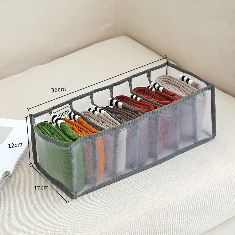 Pants and clothes storage box with partitions, designed for organizing wardrobe drawers and maximizing space efficiency.