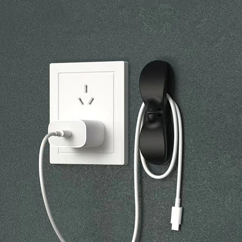 Plug holder and cable organizer designed to secure power cords and streamline wire management, keeping your workspace neat and tidy.